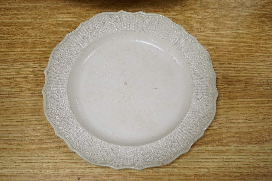 A large English salt-glazed stoneware dish and a similar plate, largest 43cm